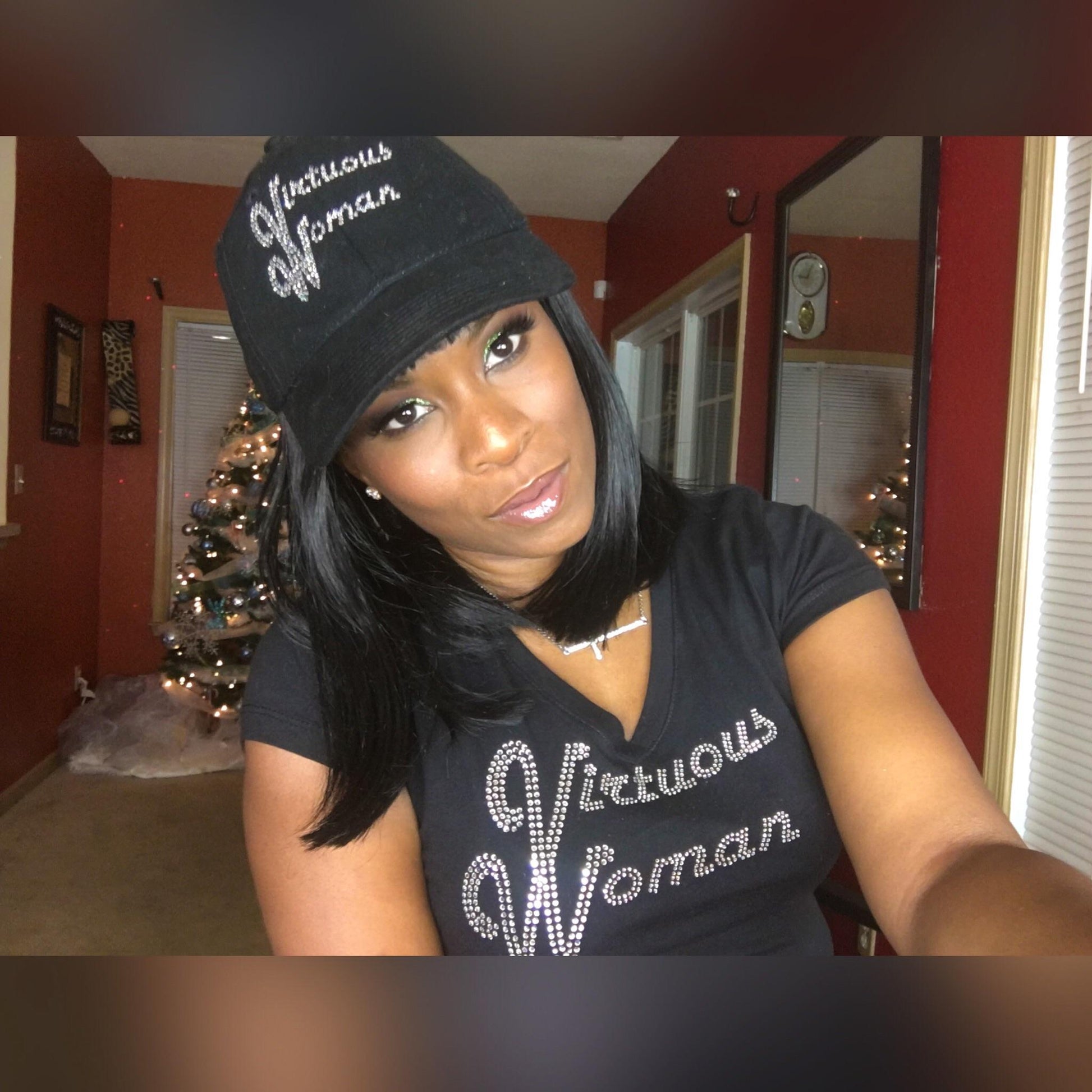 Jazzy JuJu wearing the Black World Famous Logo Hat| Virtuous Woman hat